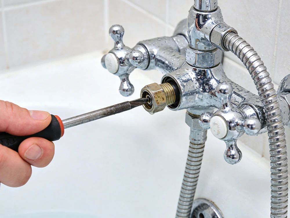 how to remove bathtub faucet